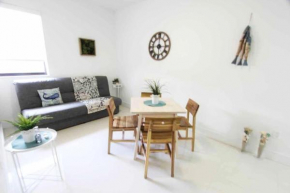 COZY APARTMENT STEPS FROM THE BEACH